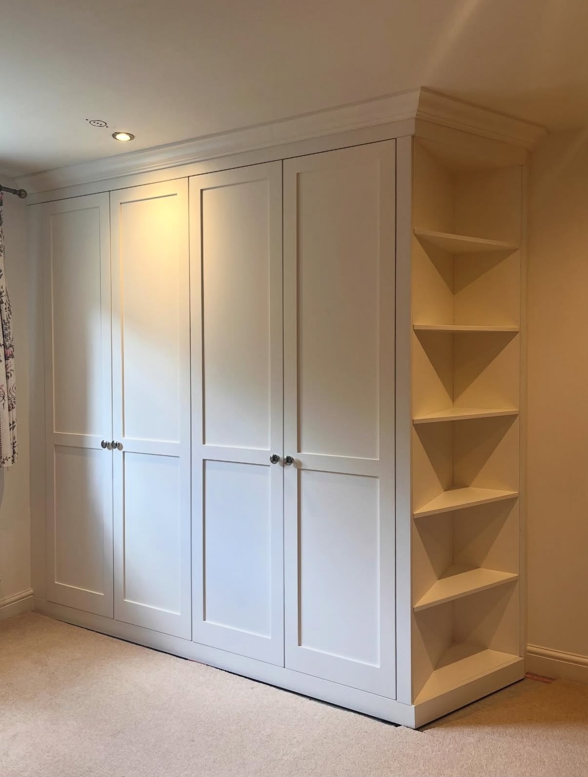 Large white fitted wardrobe with open shelving bay, made to measure